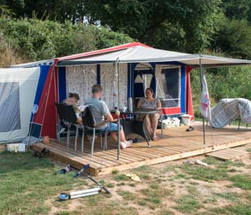 Glamping tent with room for the children close to the pool and service buildings